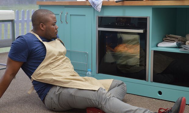 Selasi watching his pecan and maple layer cake bake